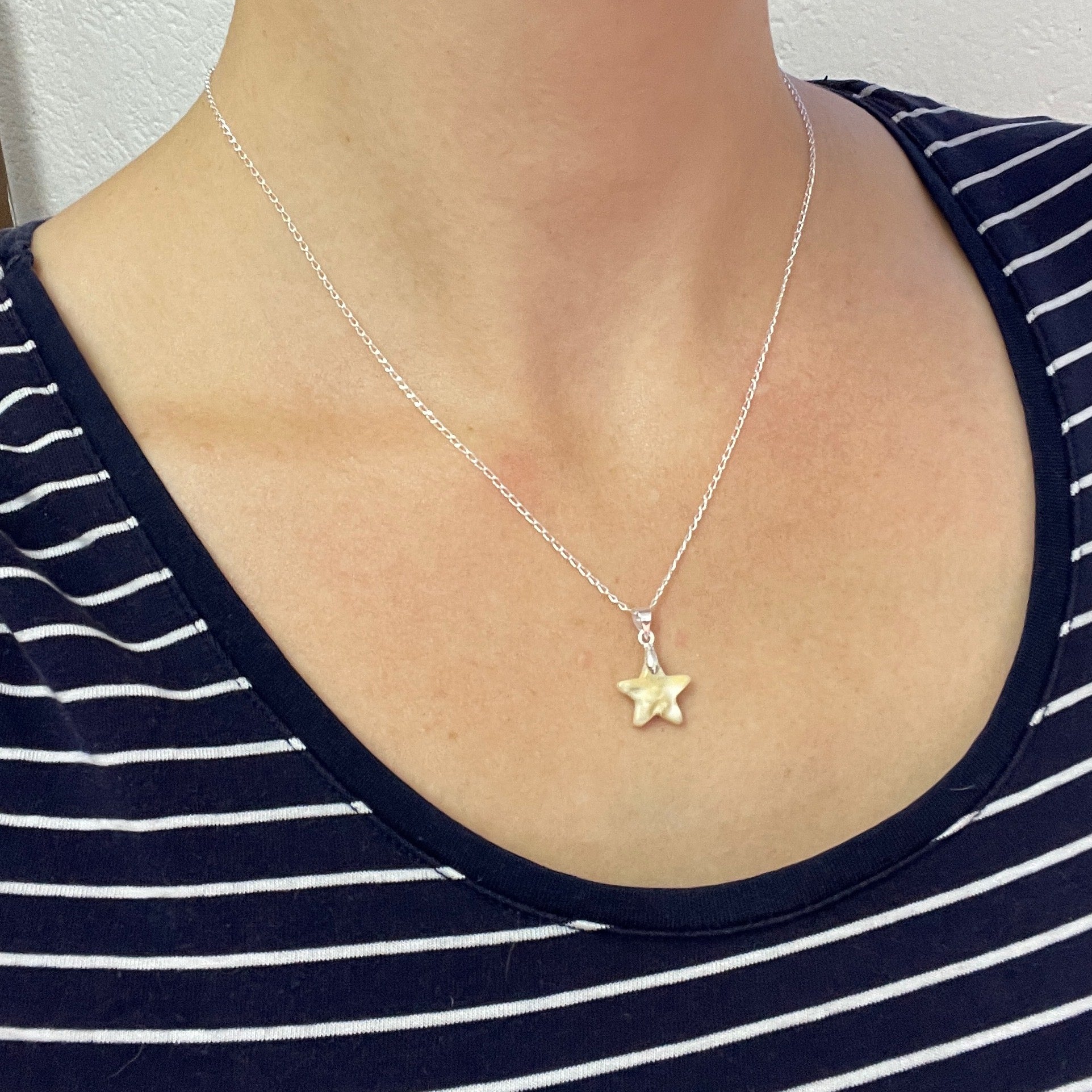 Stern-Anhänger Pferdezahn